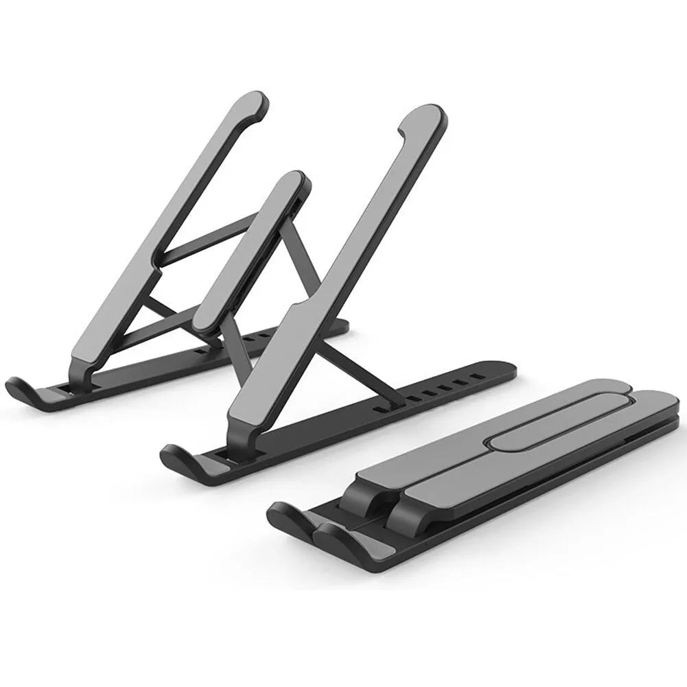 Adjustable non-slip laptop cooling stand in black with six height gears, folded flat on a desk