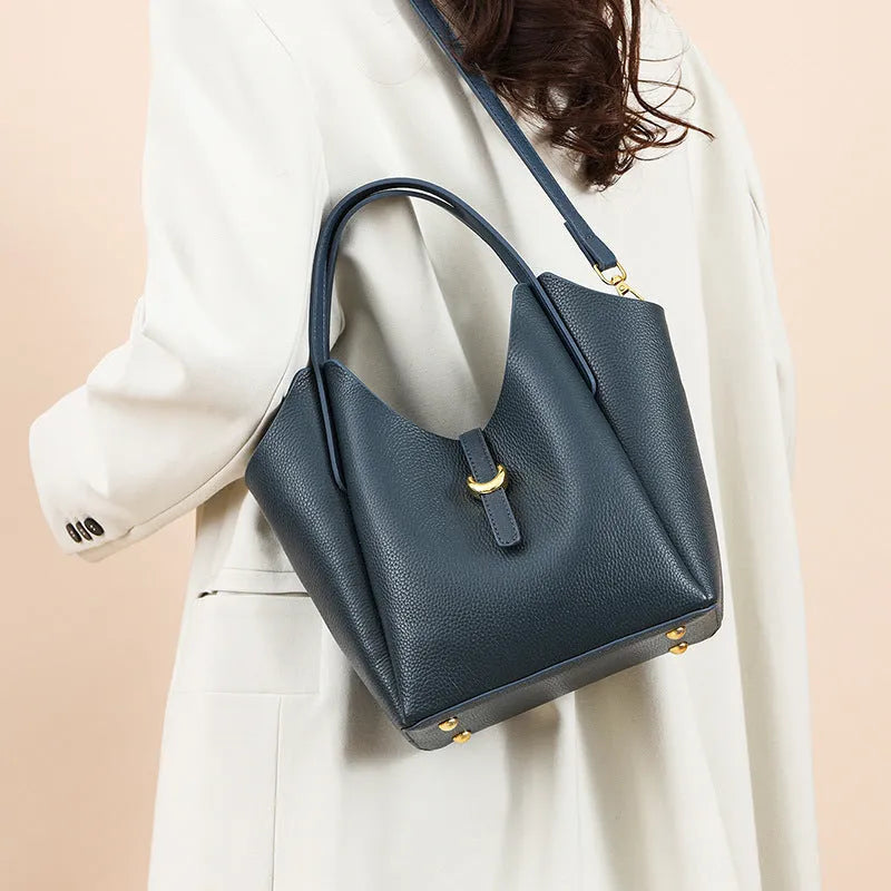Genuine leather women's bucket handbag in European American retro style with hand holding design