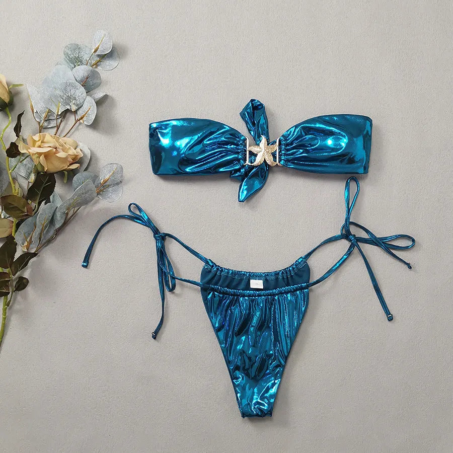 Women's glossy sapphire blue bikini set with gold starfish print and long sleeves
