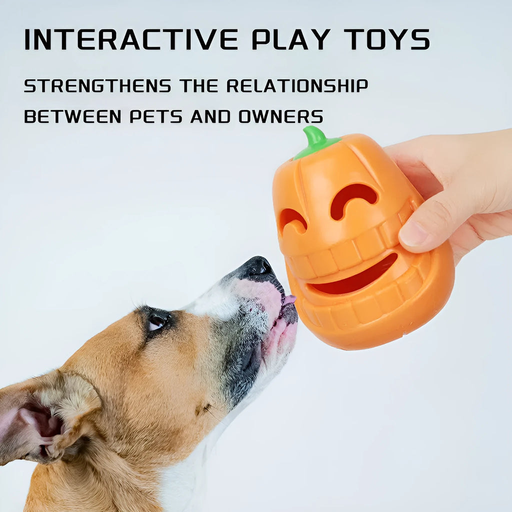Orange Halloween pumpkin-shaped dog chew toy with a treat-dispensing funnel opening.