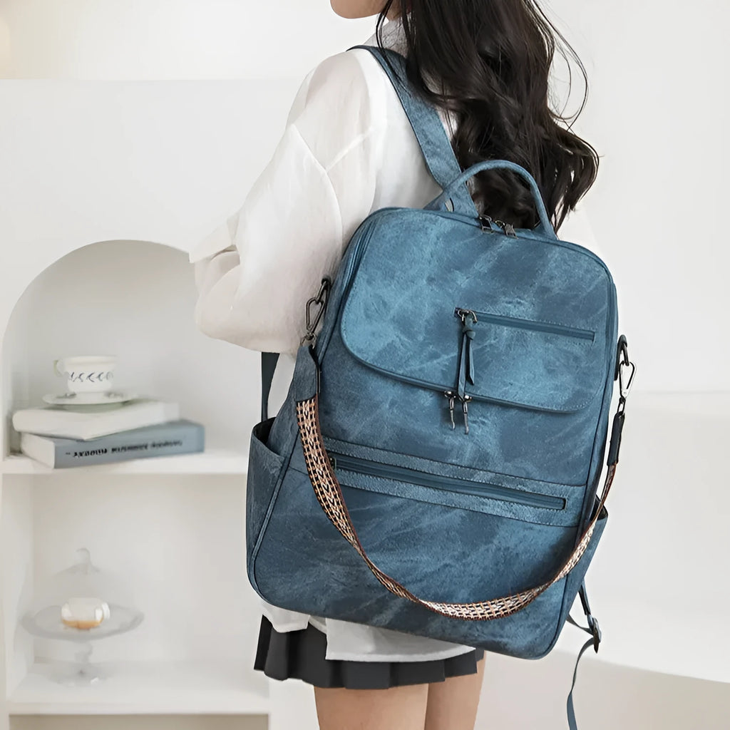 Retro style PU backpack with curved shoulder straps in one of six colour options