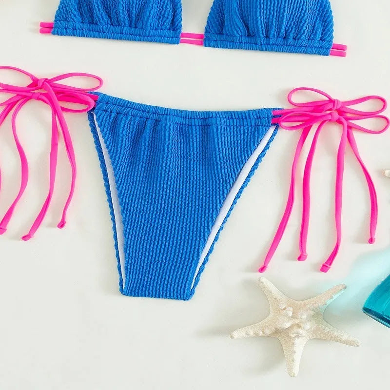 Women's lace up nylon swimsuit in solid colour, available in black, blue, light blue, purple, pink, sizes S M L