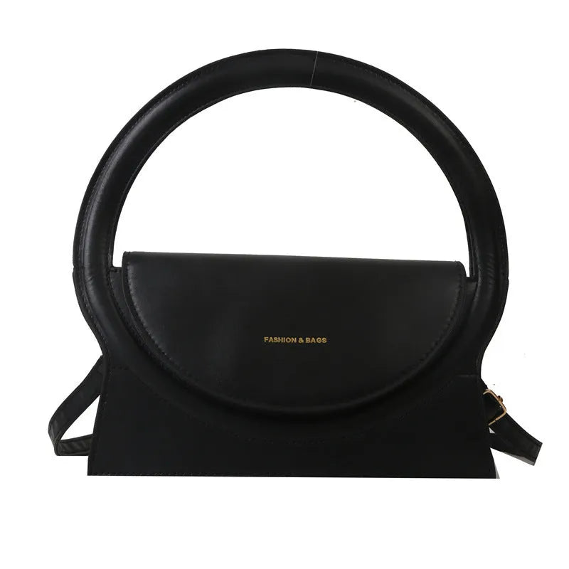 PU leather messenger bag in horizontal square shape with phone pocket and stitching details