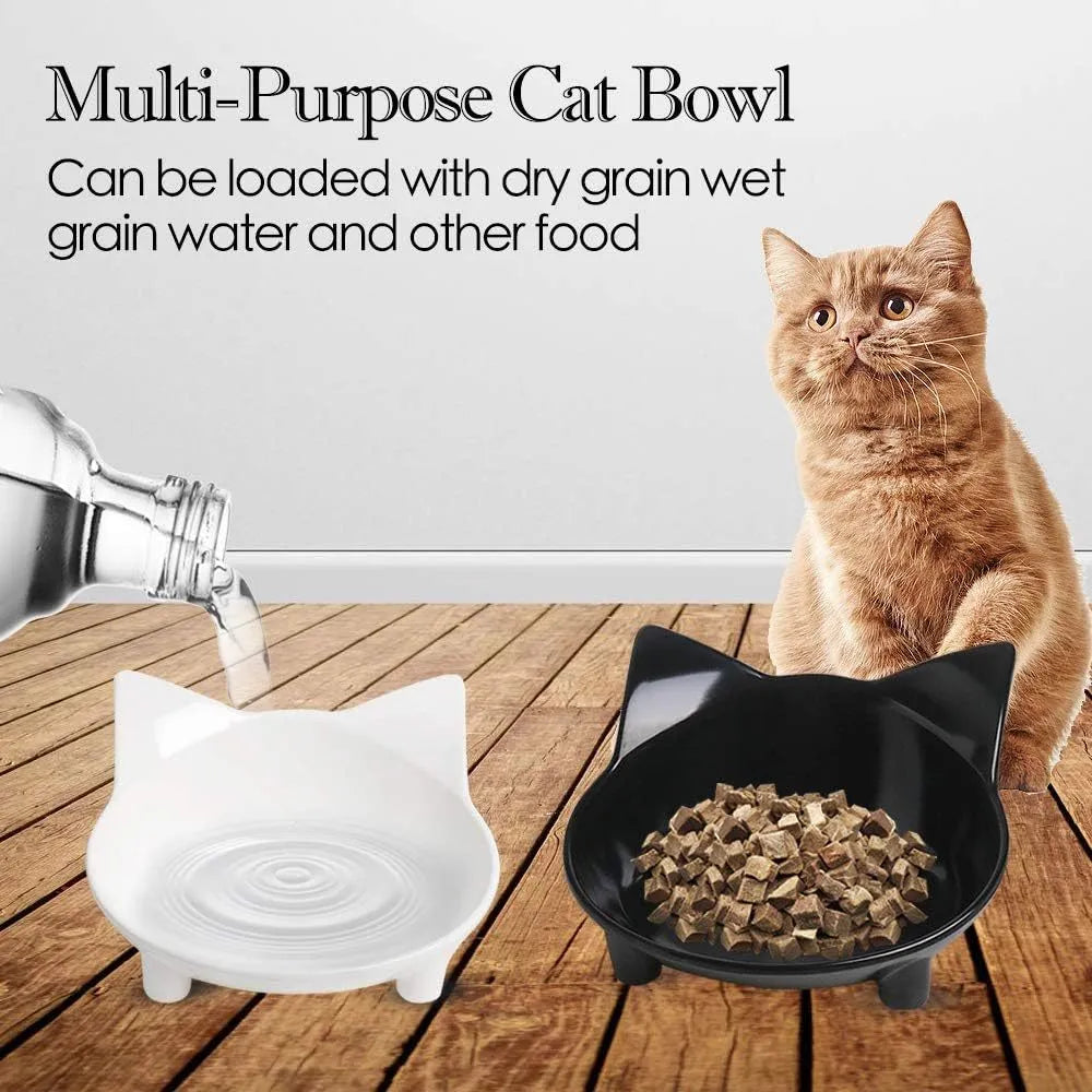 White shallow melamine cat bowl with non-slip rubber base on a wooden floor.