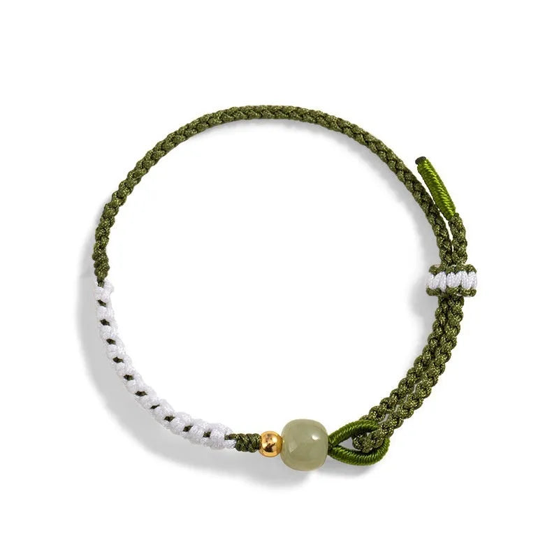 Chinese bracelet with Hetian Jade bead, sterling silver fittings, and adjustable coloured cord strap