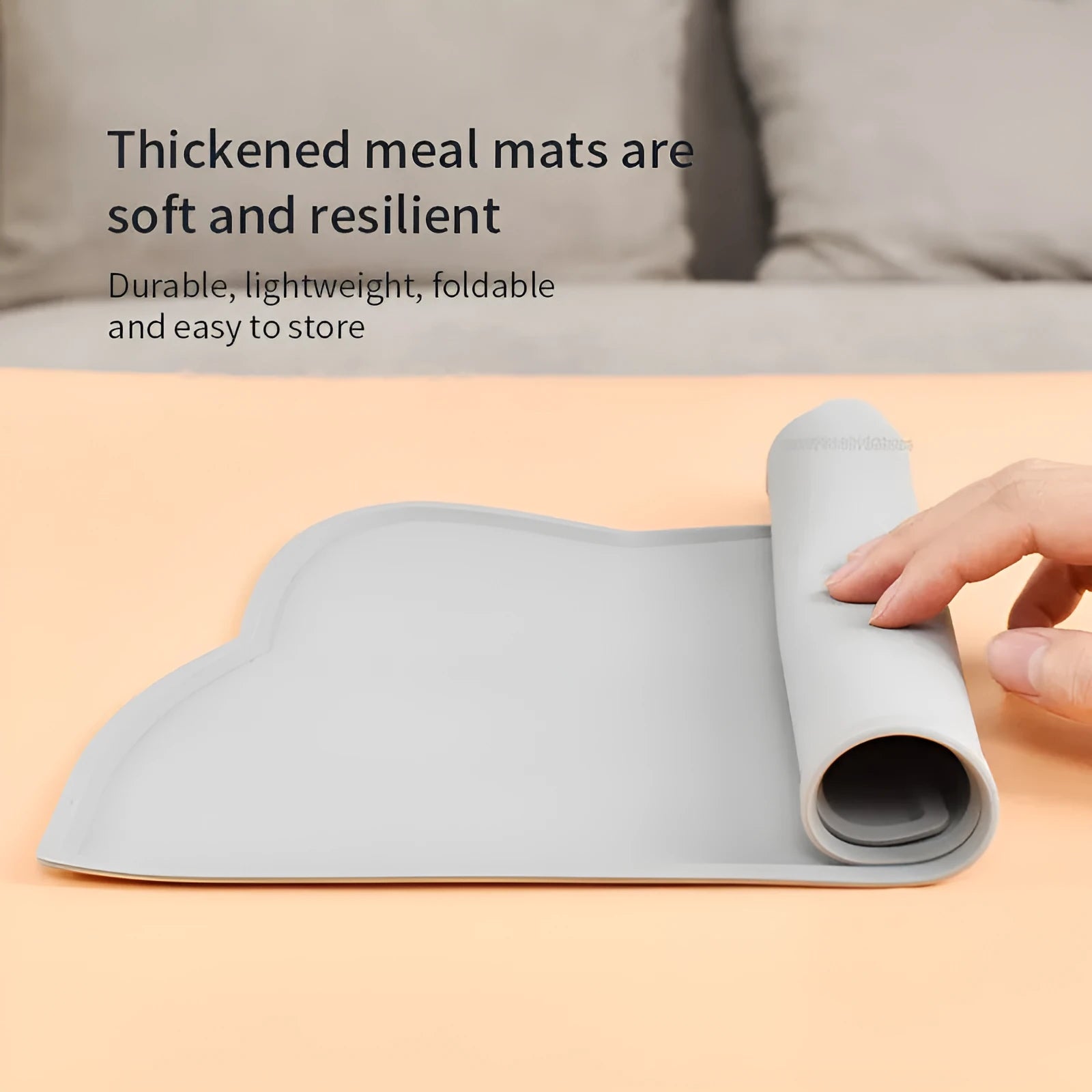 Blue silicone waterproof pet feeding mat with cat head shape, 44 by 24 centimetres
