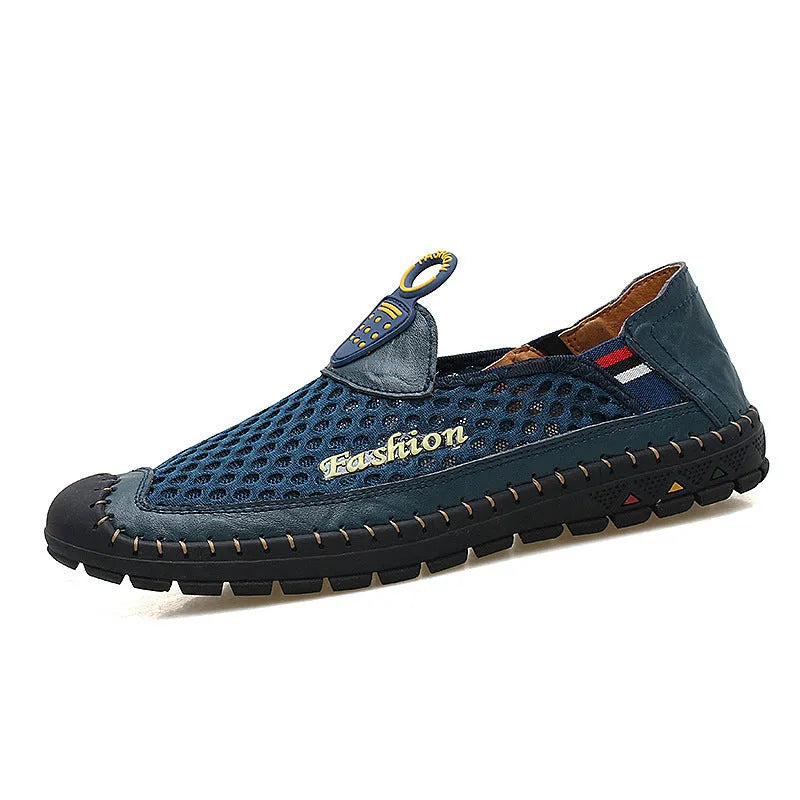 Men's brown breathable mesh casual shoes with round toe and rubber sole on a plain background.
