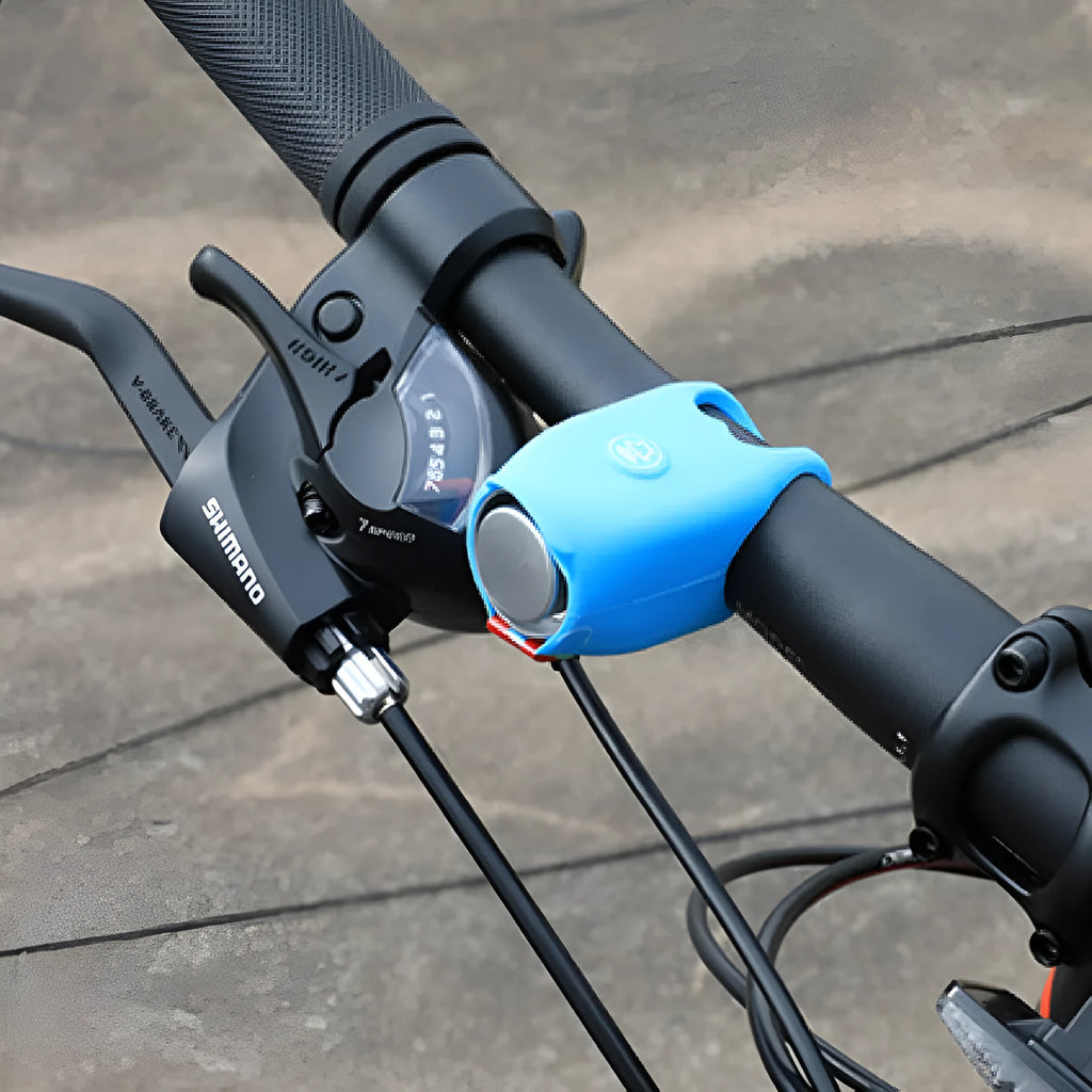 Plastic bicycle electronic horn in black with 12.5cm length and button battery compartment