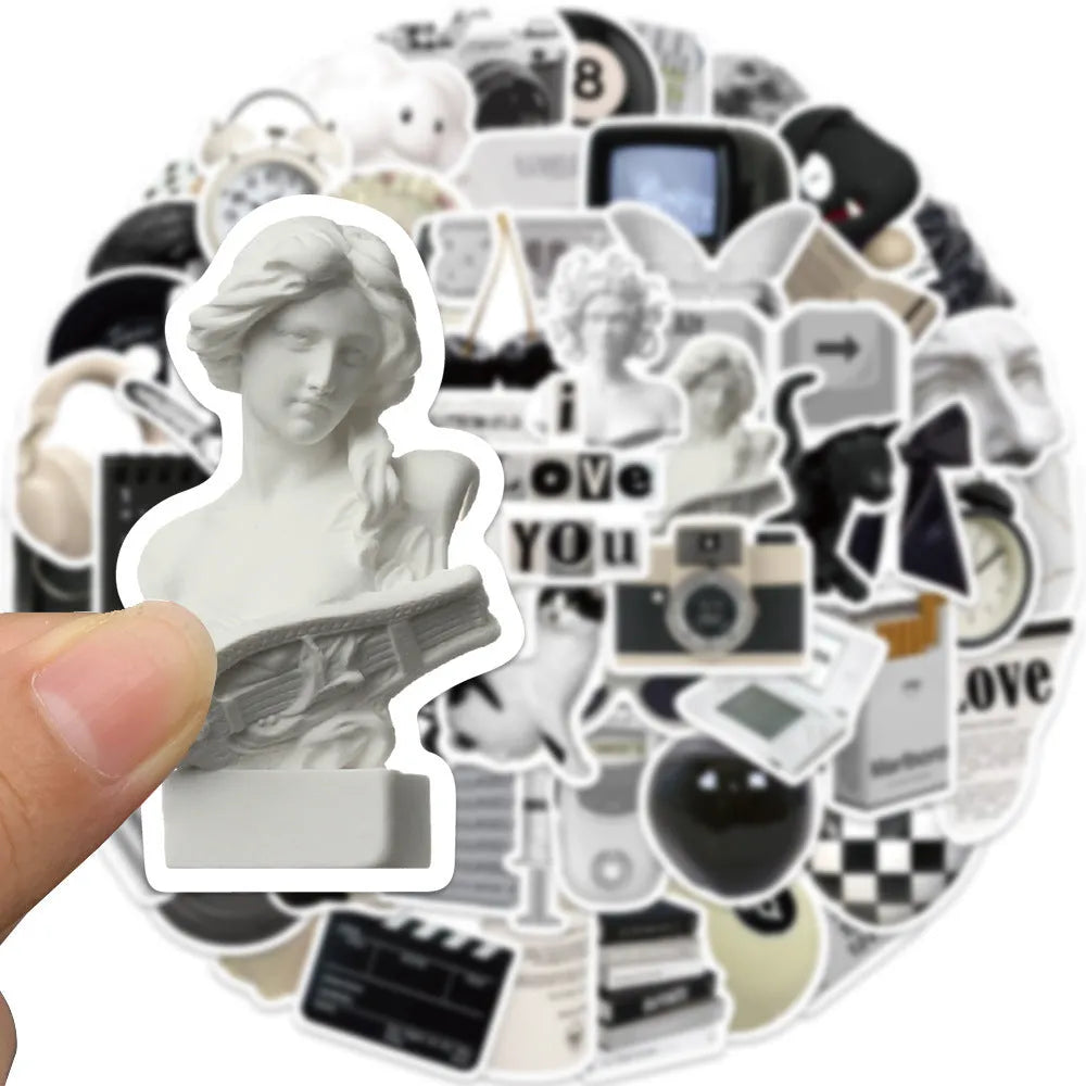 A pack of 61 black and white simple design waterproof PVC stickers for laptops and personal items.