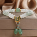 Green crystal Tian Shan Cui abacus beads jade bracelet with retro butterfly tassel and pearl decoration