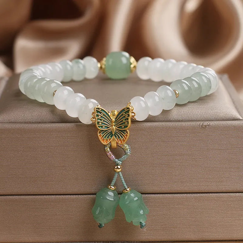 Green crystal Tian Shan Cui abacus beads jade bracelet with retro butterfly tassel and pearl decoration
