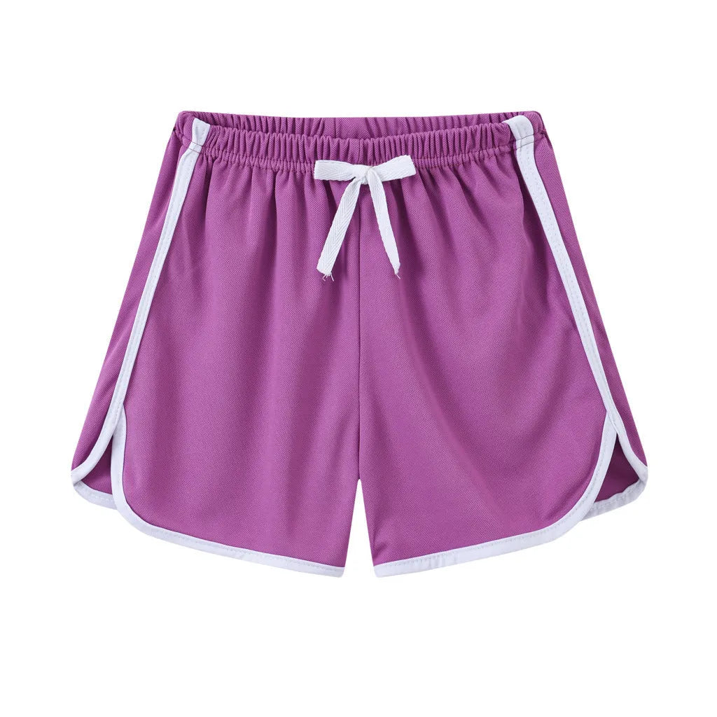 Children's polyester casual shorts in multiple colours and patterns including stripes, leopard print, and floral designs.