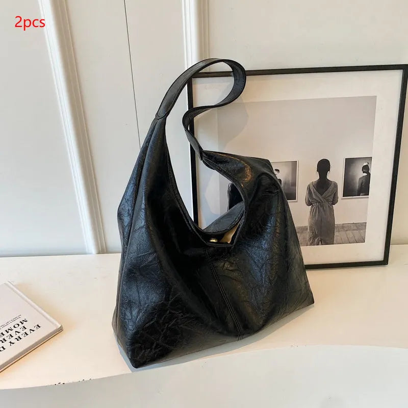 Women's casual soft leather shoulder bag in street trend style with sandwich pocket design