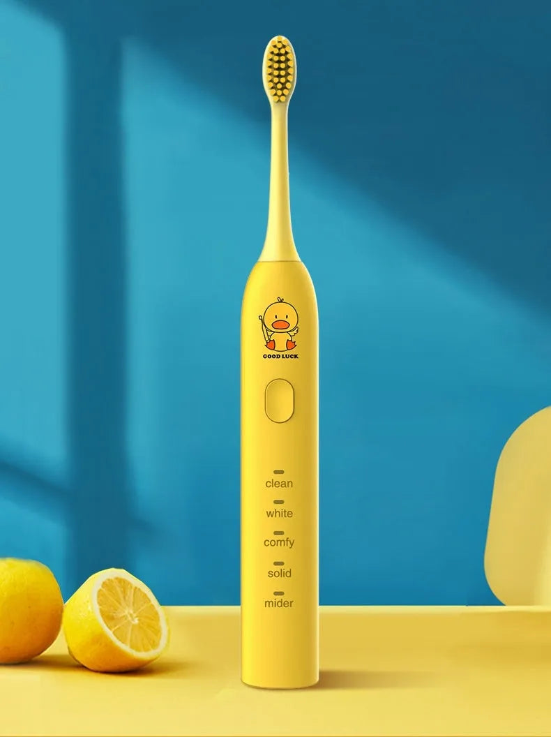 Yellow USB rechargeable electric toothbrush with small duck laser engraving and soft bristle head