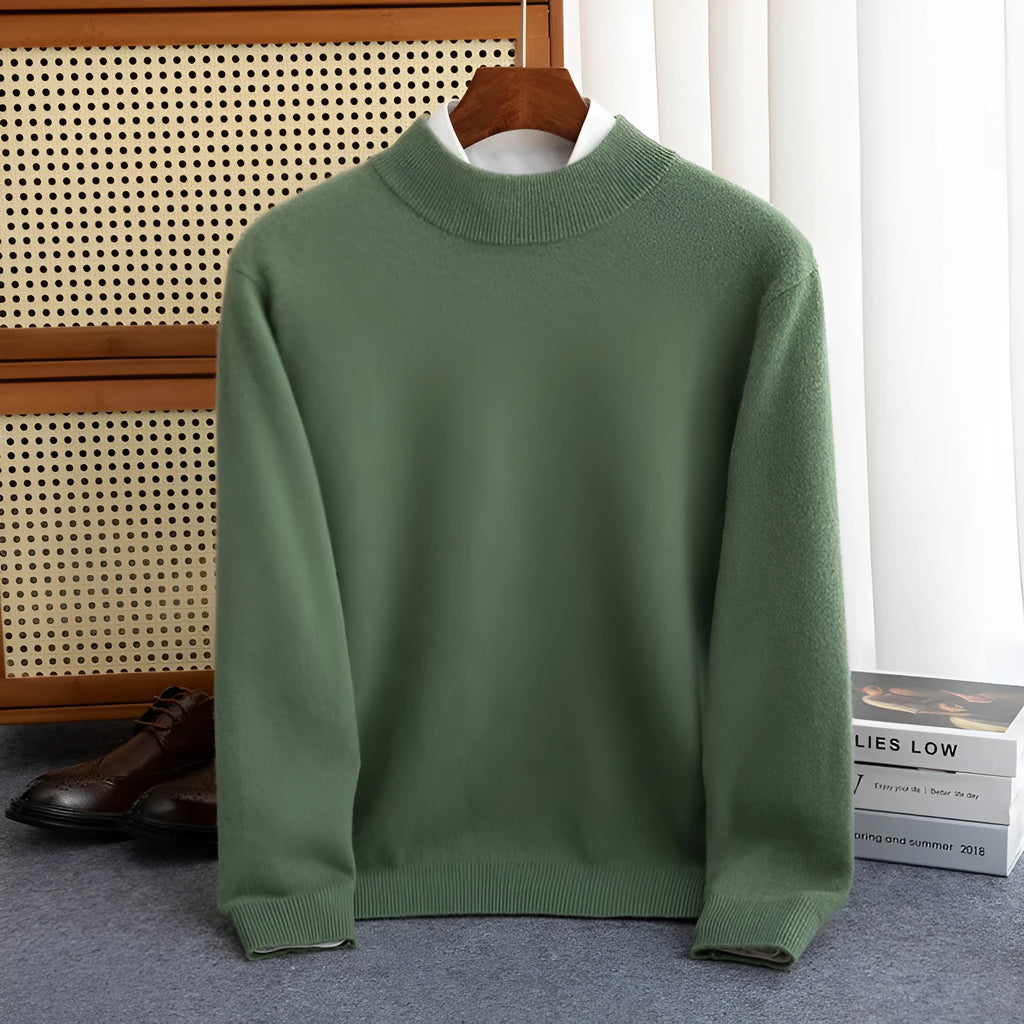 Man wearing a loose-fit half-collar wool sweater in a dark colour, showcasing the knit texture and collar style.