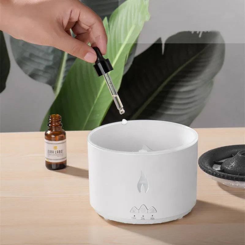 New two-colour spray ring volcano humidifier in black with a round body and single fog outlet