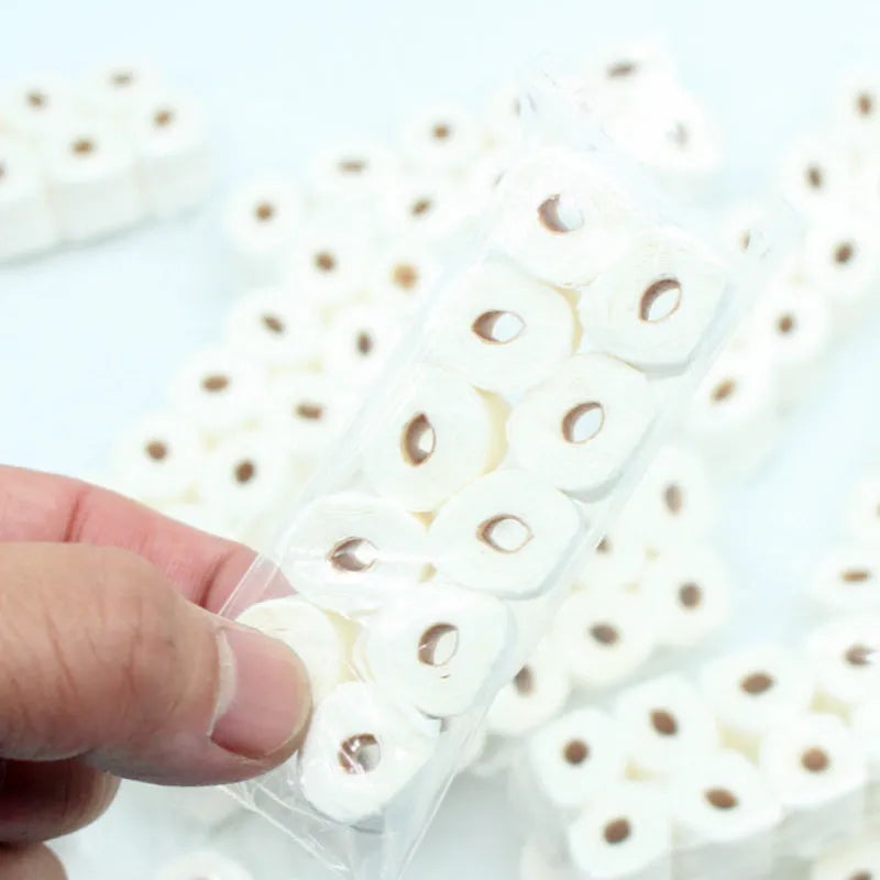 Miniature paper simulated tissue roll model measuring 30x15x80mm for children's pretend play.