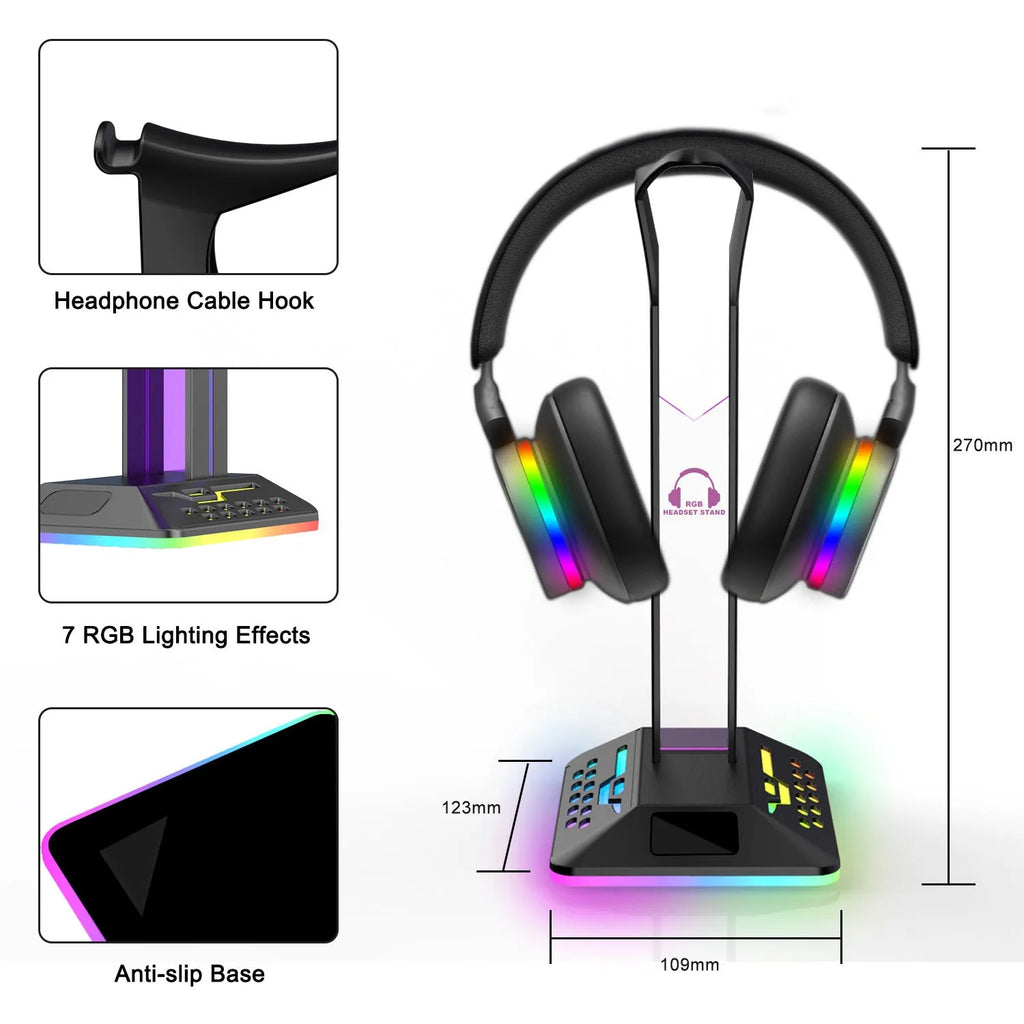 RGB colour changing headphone stand with dual USB ports on a desk next to a gaming headset.