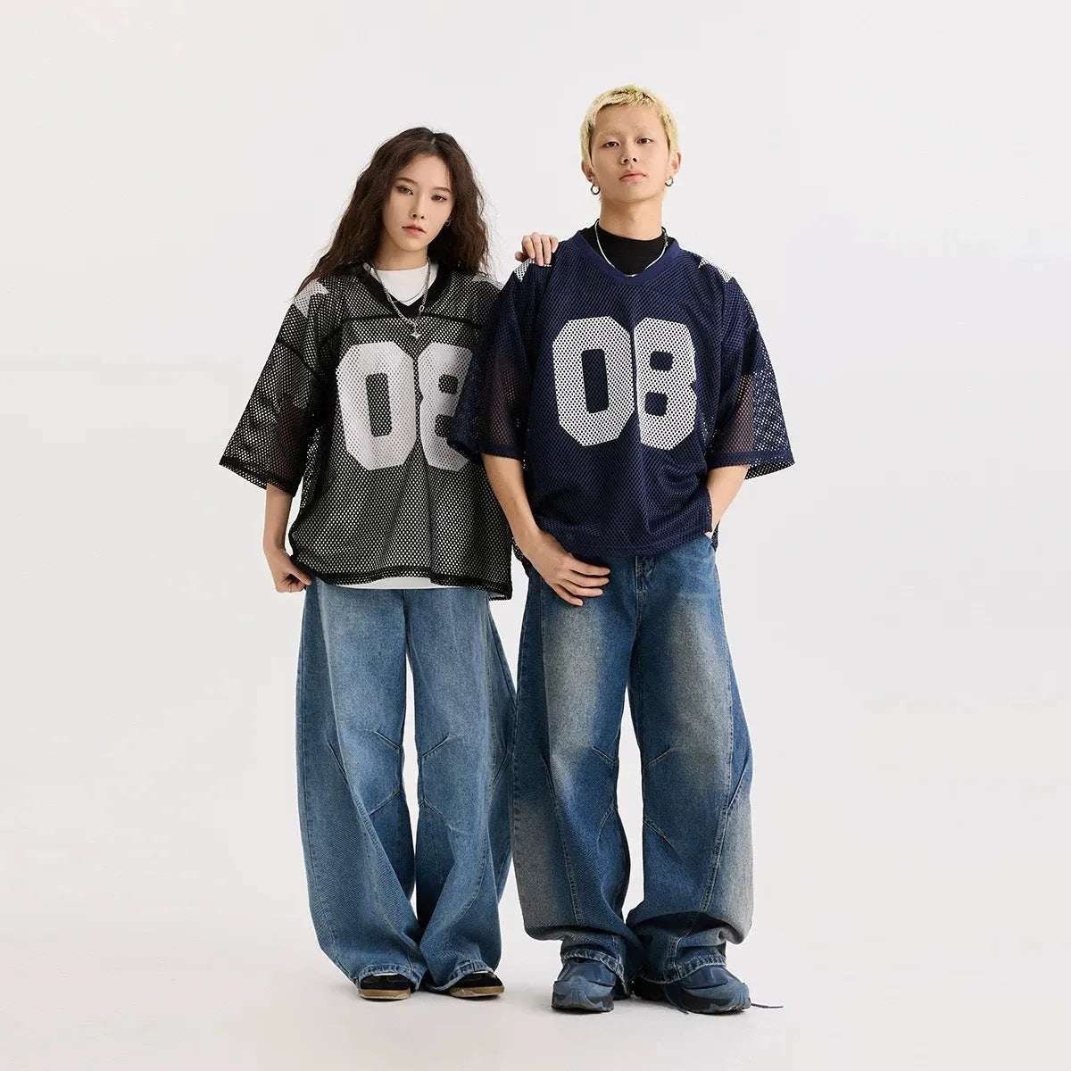 Half sleeve pullover shirt with letter pattern in black and navy blue colours, loose fit design