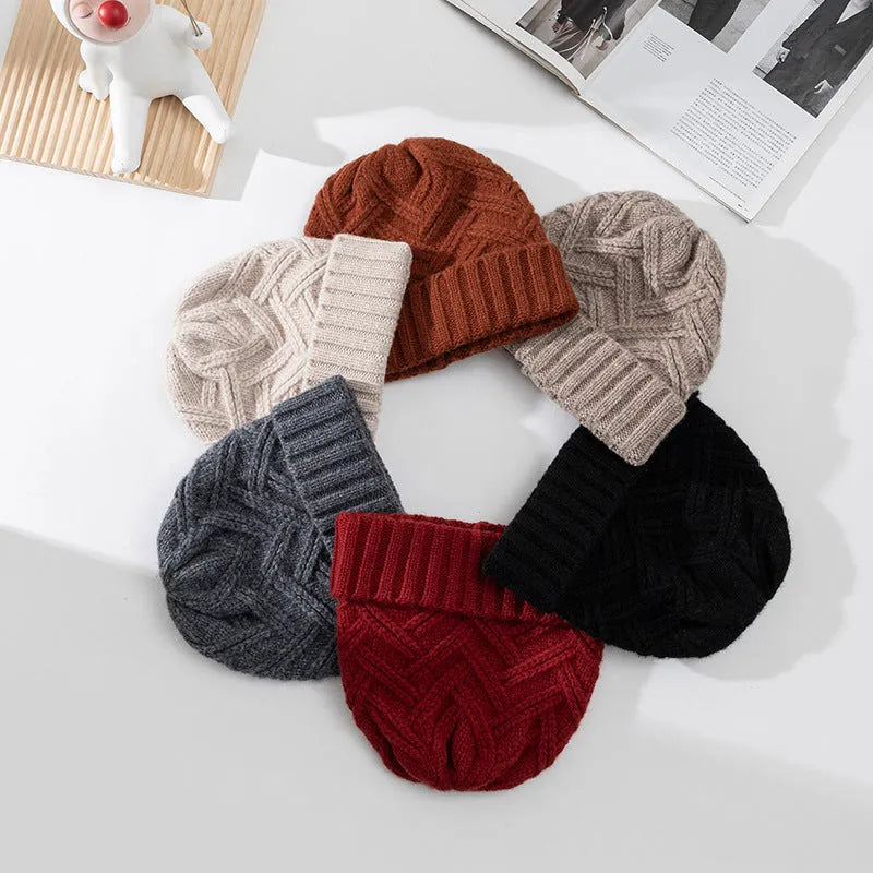 Women's wool knitted dome winter hat in ankela red colour showing thickened knitting texture
