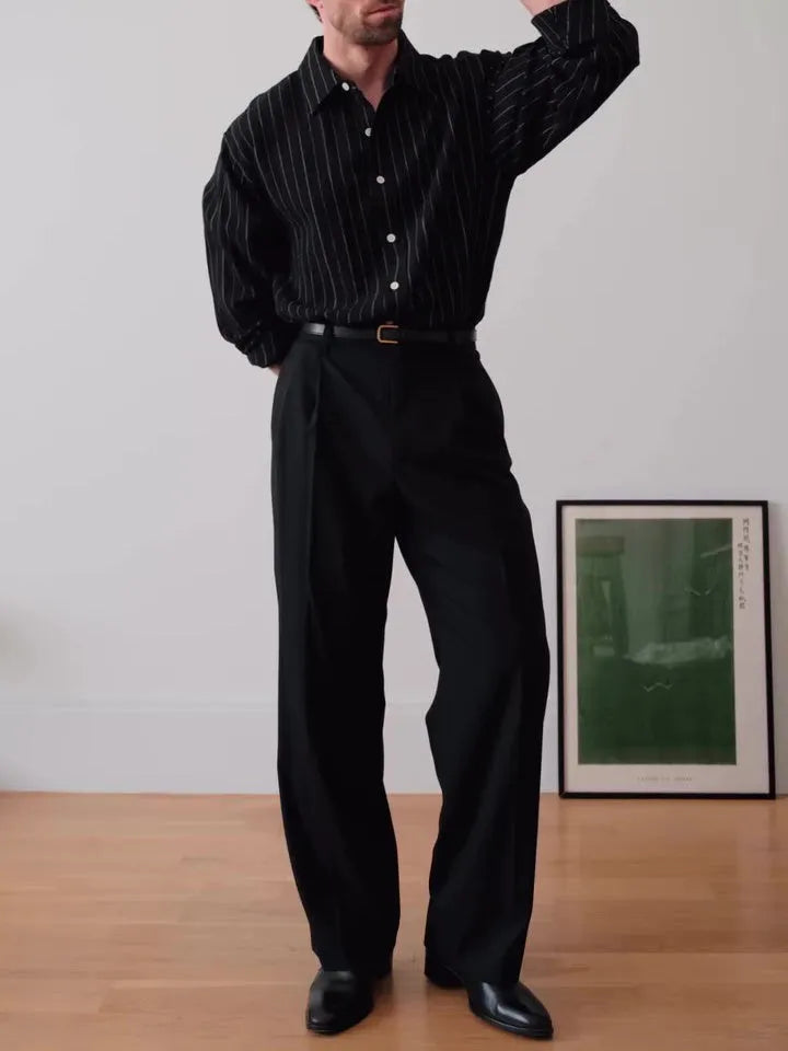 Black pinstriped button-down shirt with regular fit and striped pattern on polyester fabric