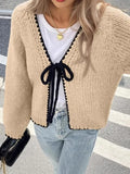Lace-up cardigan with crocheted flowers in solid colour polyester, loose long sleeves