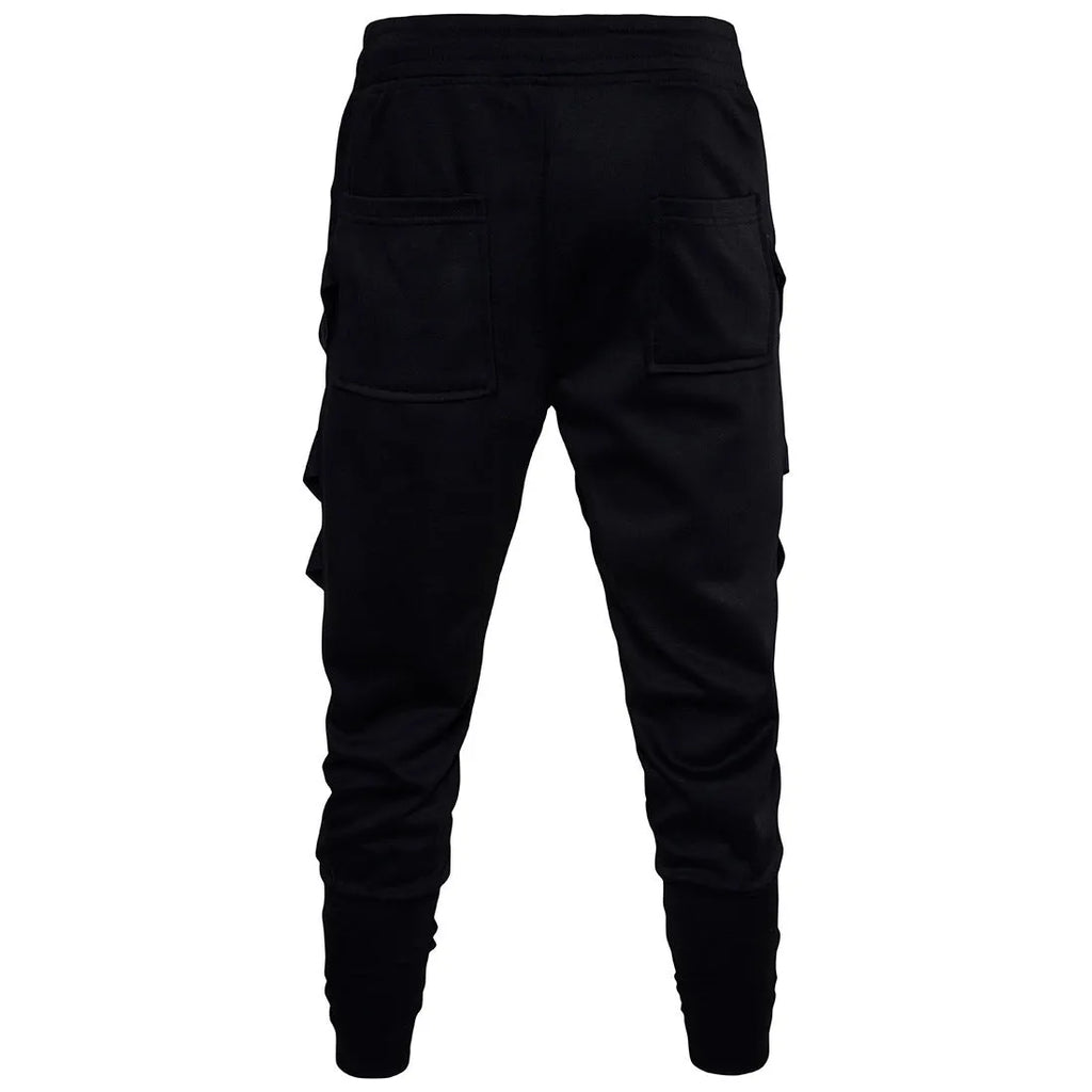 Low crotch cross pants for men in black with tapered leg and small foot opening