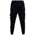 Low crotch cross pants for men in black with tapered leg and small foot opening