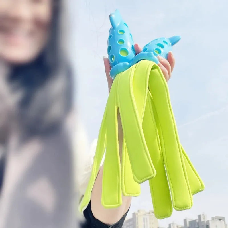 Blue dog chew toy shaped like a cuttlefish with squeaker for teeth cleaning and interactive play