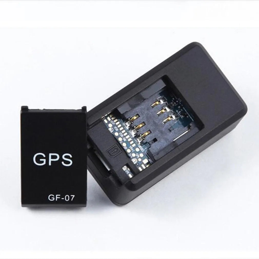 Black mini GPS car tracker device with magnetic mount for vehicle tracking