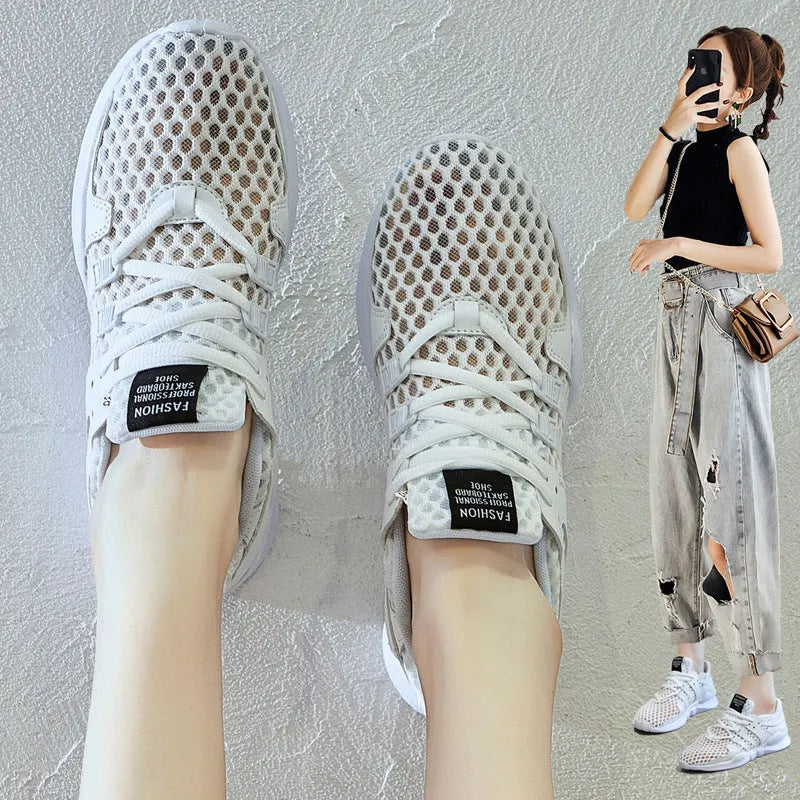 Low-top mesh sneakers in white with a hollow-out EVA sole design on a solid colour background.