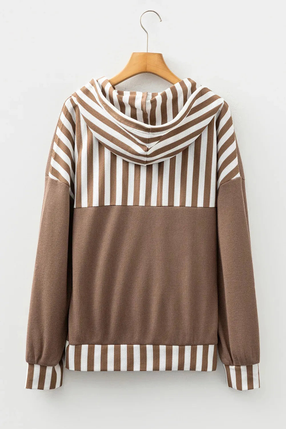 Straw yellow waffle texture hoodie with striped patchwork panels and button neck closure