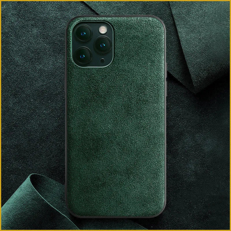 Suede mobile phone case for iPhone in elegant black, dark night green, and dark blue colours.