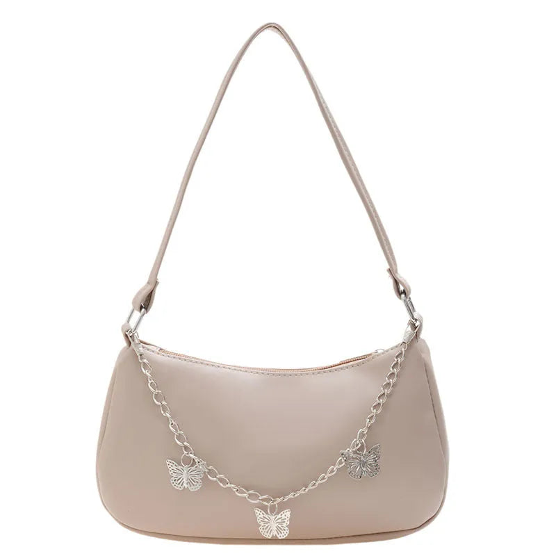 Black PU leather butterfly chain crossbody bag with a square shape and outer pocket.