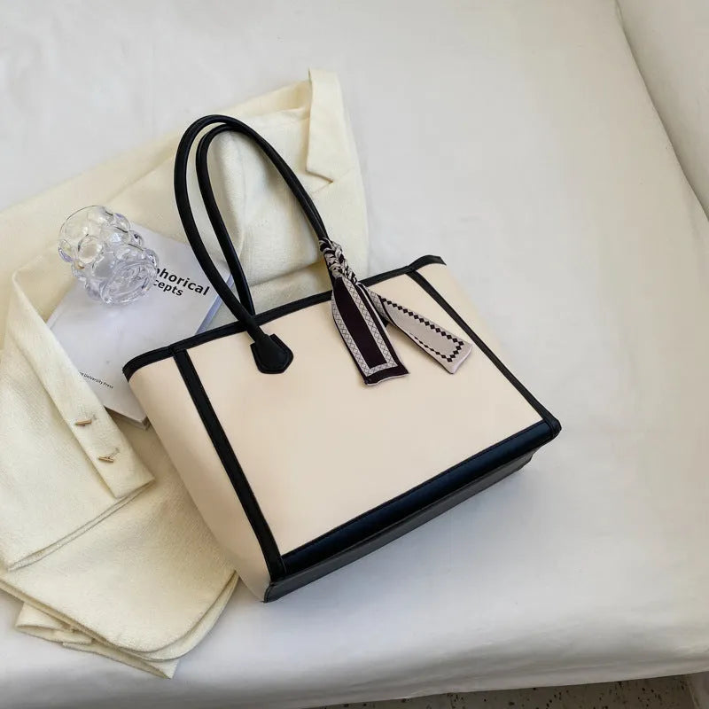 Advanced Texture Winter Commuter Tote Shoulder Bag in black colour, horizontal square shape with open outer pocket and textured PU finish