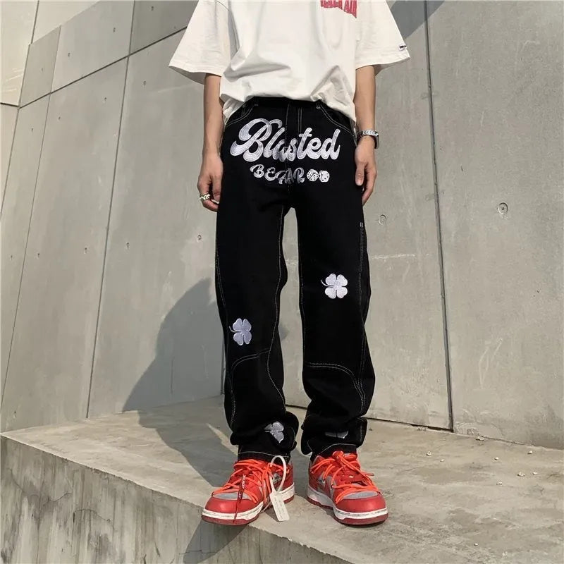 Men's American retro printed casual trousers with button placket and small straight leg in graphic colour