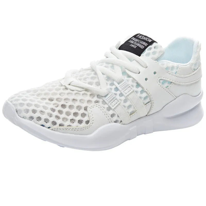 Low-top mesh sneakers in white with a hollow-out EVA sole design on a solid colour background.