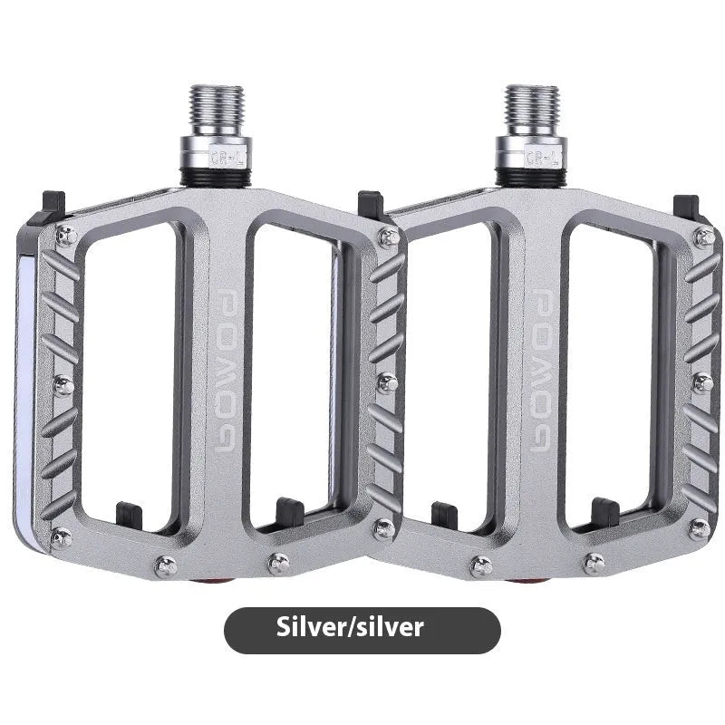 Pair of aluminium alloy bicycle pedals with integrated 710LED lights in black finish