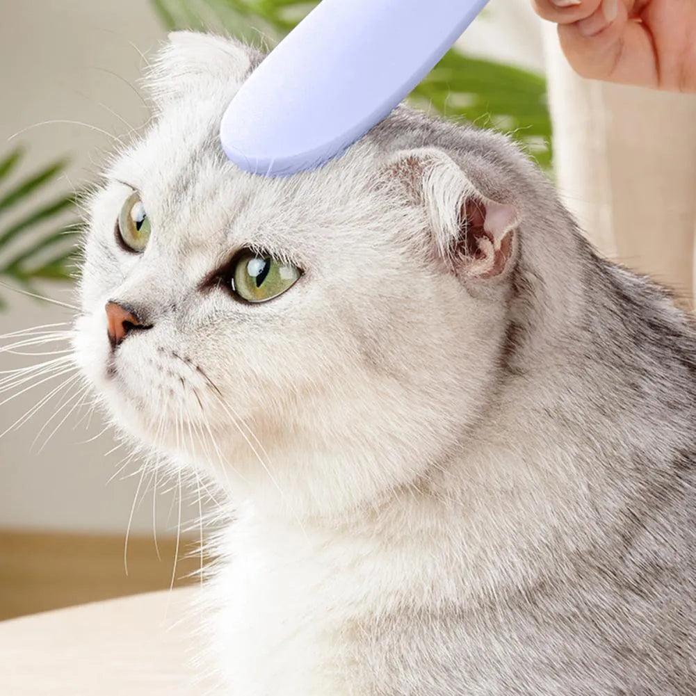 Gray ABS cat comb with tongue massage surface and ergonomic handle