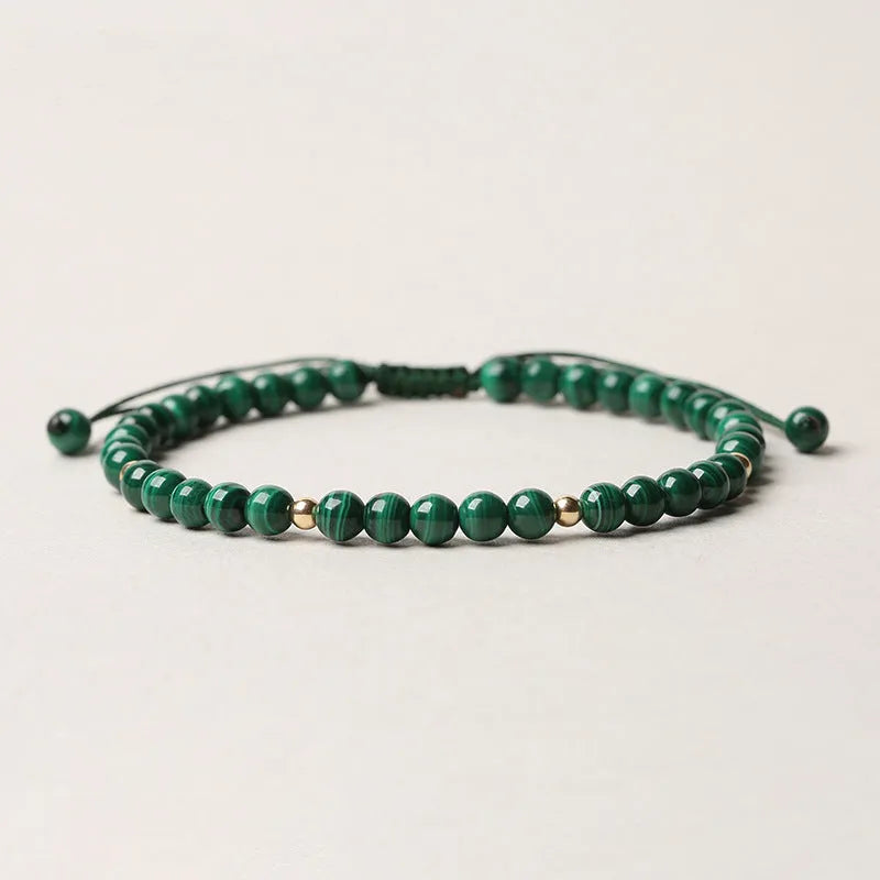 Natural malachite crystal bracelet for women with handwoven golden balls strap and textured green stone