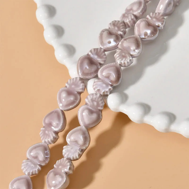 Ceramic love heart beads in assorted colours, 10x15mm with 1.7mm hole, 20-piece pack