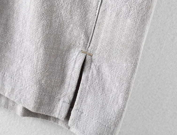Men's loose-fit linen casual shirt in a solid colour on a hanger