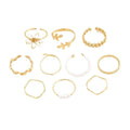 Women's openwork flower ring set with glossy gold finish and floral design