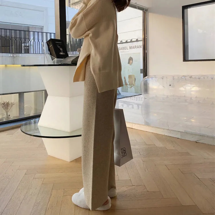 Women's high waist knitted wide-leg trousers in cream white colour with elastic waistband