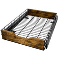 Black household storage rack with wood and iron construction and pull basket mechanism