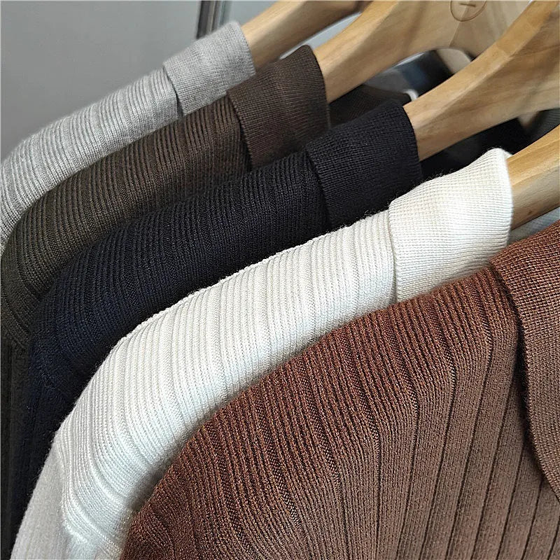 Man's loose-fit long-sleeved knitted pullover sweater in a modal and rabbit fur blend.