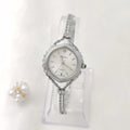 Women's quartz watch with gold copper plating, 25mm dial, mineral glass mirror, and metal chain strap on white background