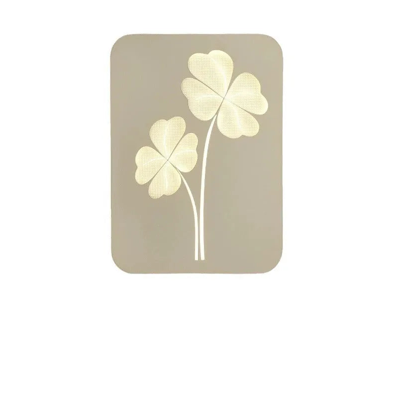 Modern wall lamp with decorative acrylic shade showing love heart design in pink colour option