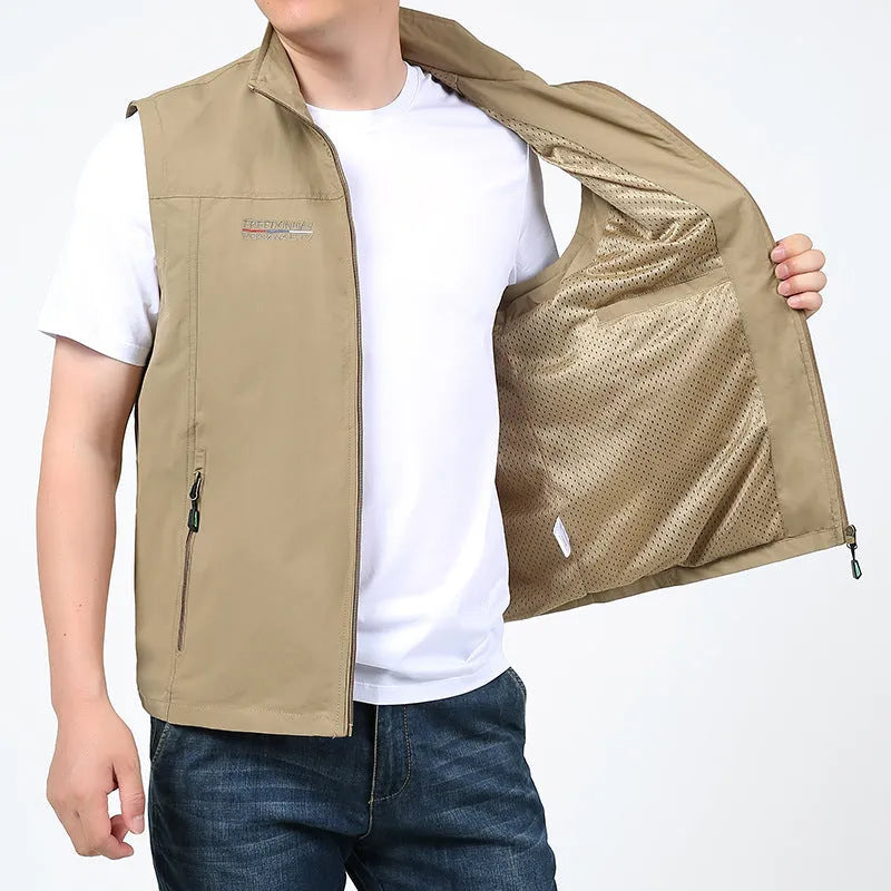 Man wearing a striped khaki casual hooded vest with multiple patch pockets on the front.