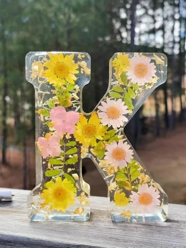 Letter flower transparent resin night light ornament with 15cm dimensions on a table